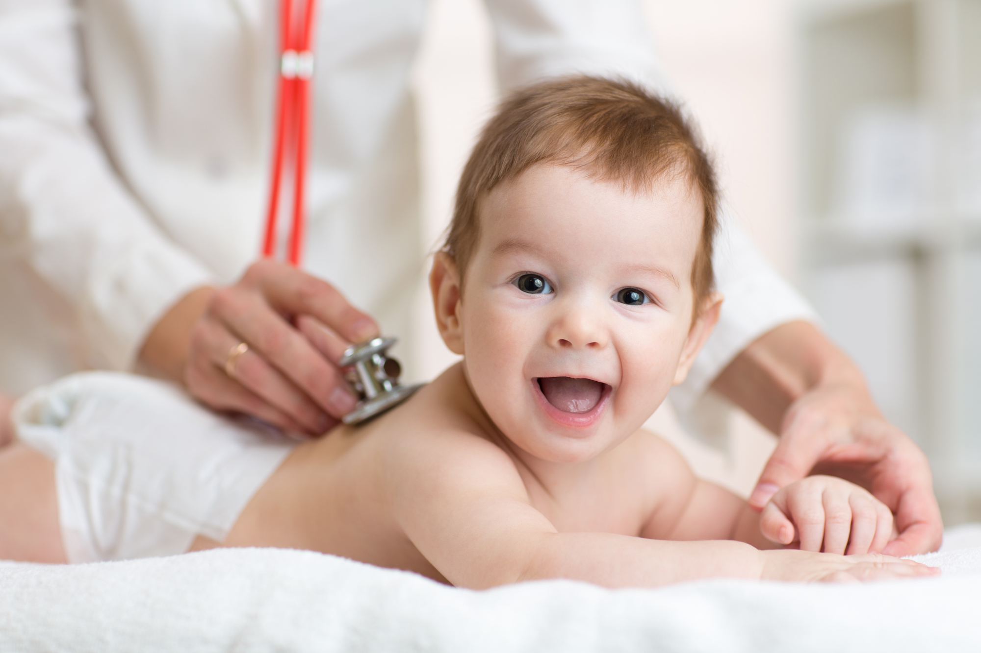 Pediatrician Performing Physical Exam on a Baby 